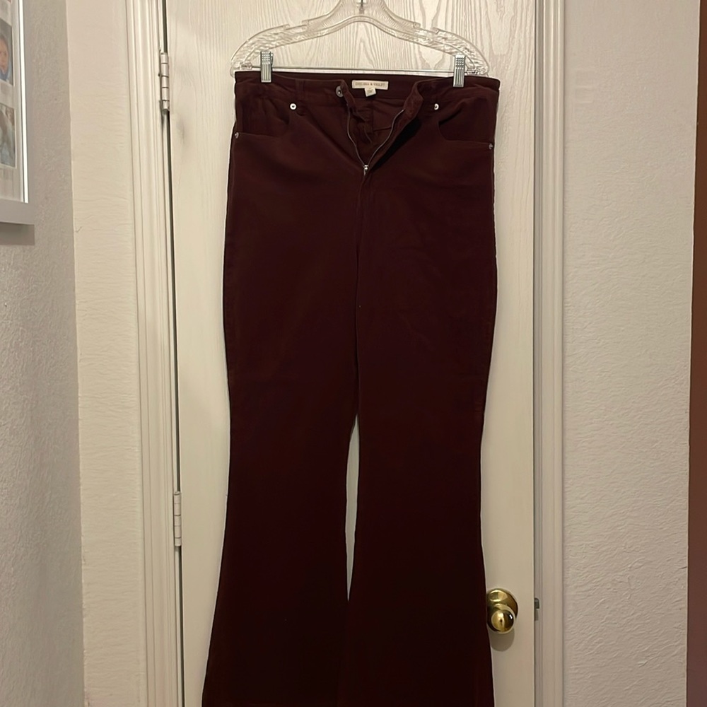 Chelsea & Violet size 31 high waisted flare corduroy pants in a red-brown color.